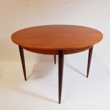 Danish teak dining table with extension cords 1960