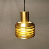 Hanging lamp in gold-colored aluminum with many layers of shades.
