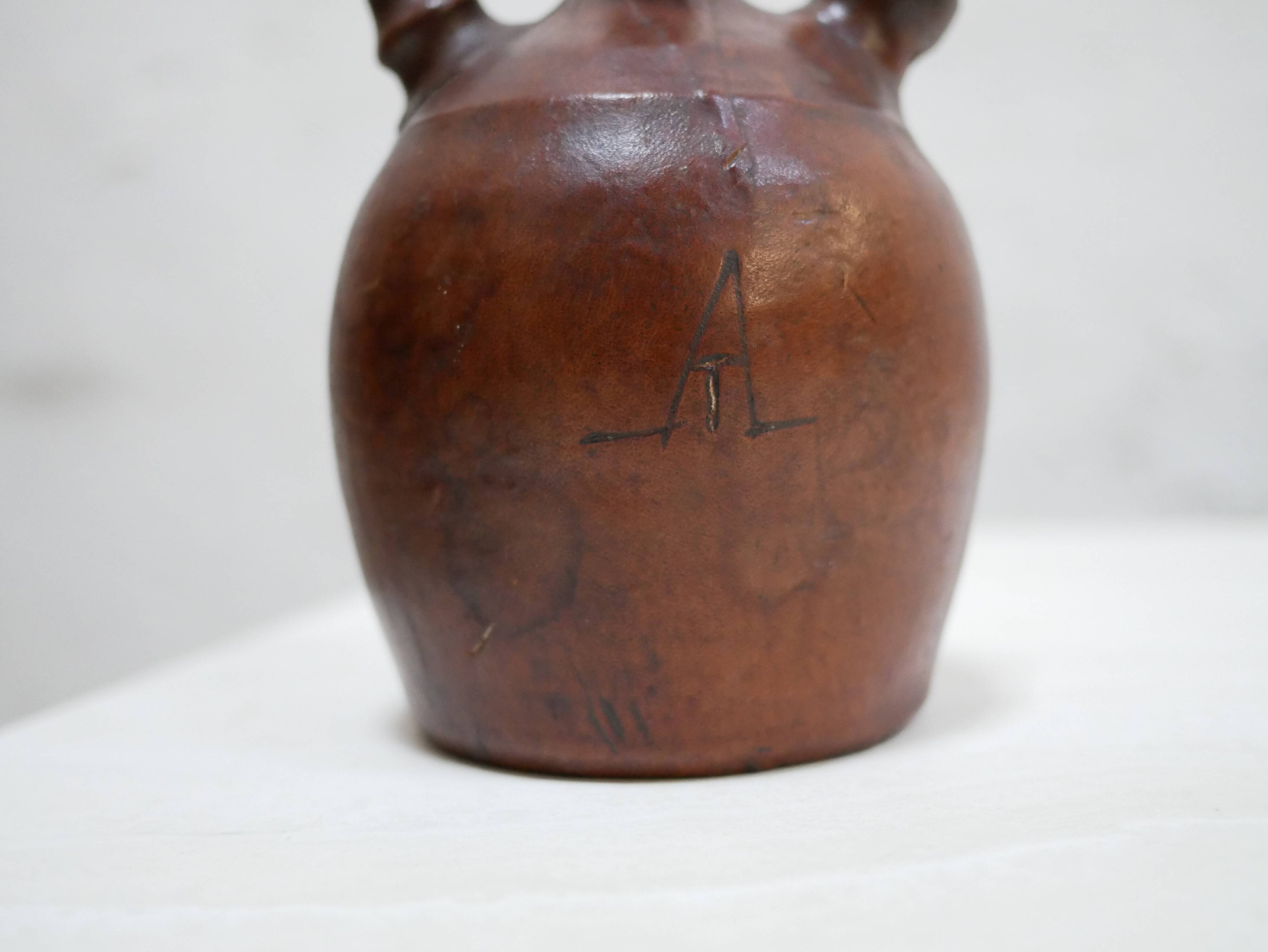 Vintage leather gargoulette pot