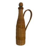 Grande bouteille en verre et osier