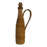 Grande bouteille en verre et osier