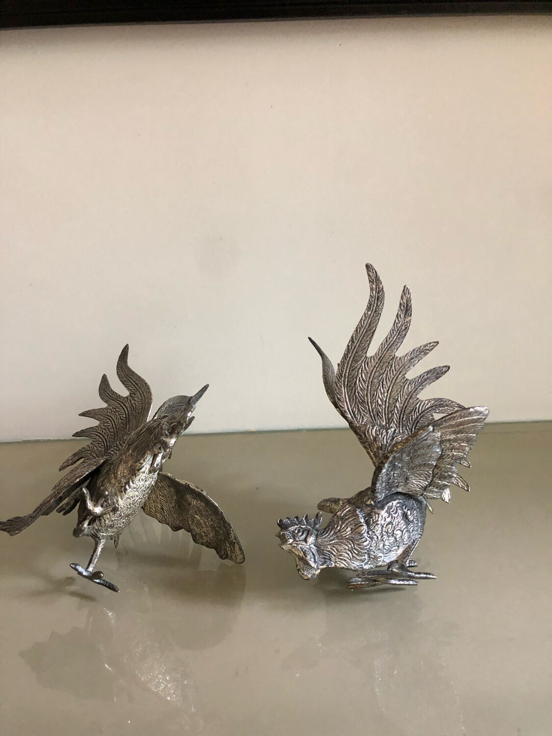 Vintage silver metal roosters