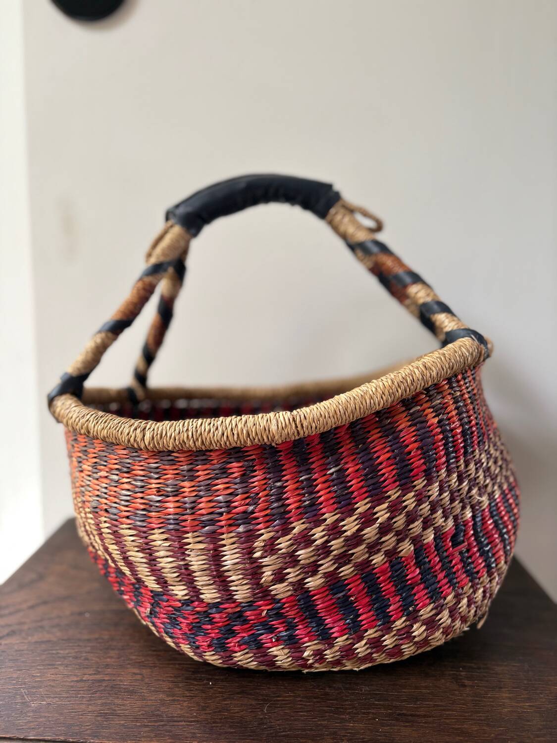 Vintage colorful woven rush ethnic basket