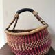 Vintage colorful woven rush ethnic basket