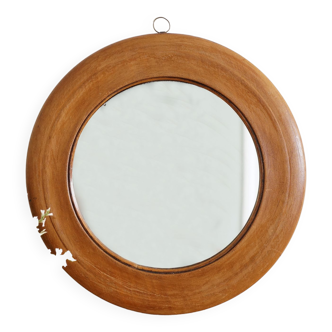 Antique round mirror with turned wooden frame