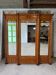 Three-door mirrored wardrobe in faux bamboo style from the 19th century.
