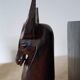 Pair of vintage wooden bookends with stylised horse heads.