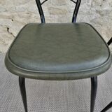 Pair of black metal chairs and khaki green skai, 60s