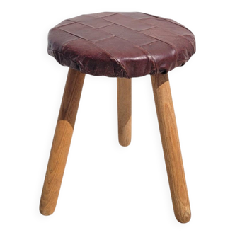 Leather-upholstered tripod stool
