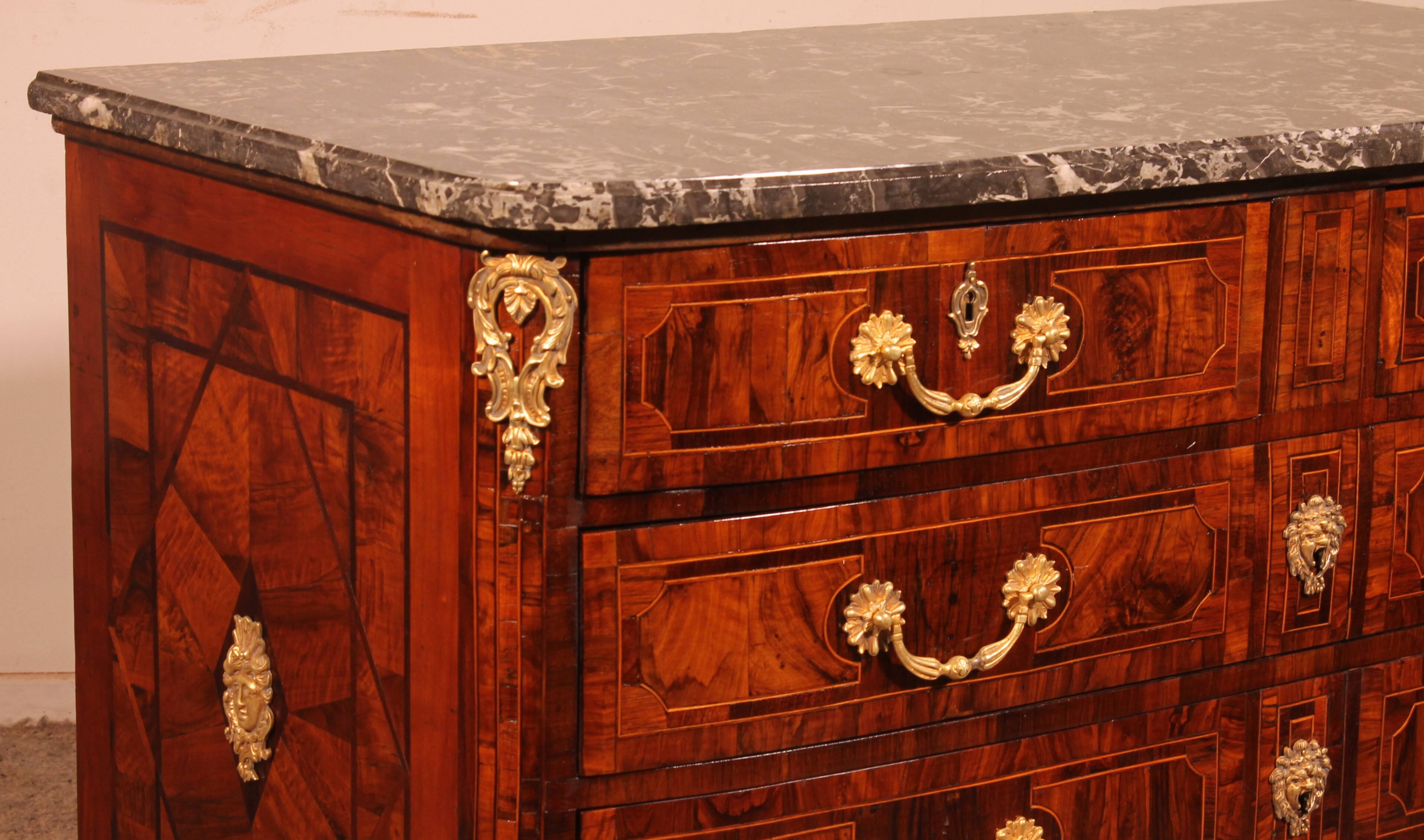 Dauphiné commode from the Louis XIV period in olive wood marquetry.