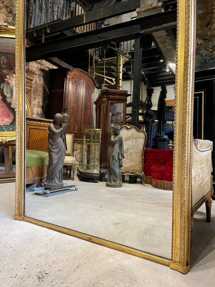 Louis XVI style gilded wood mirror from the Napoleonic III era, 2.75m x 1.48m.