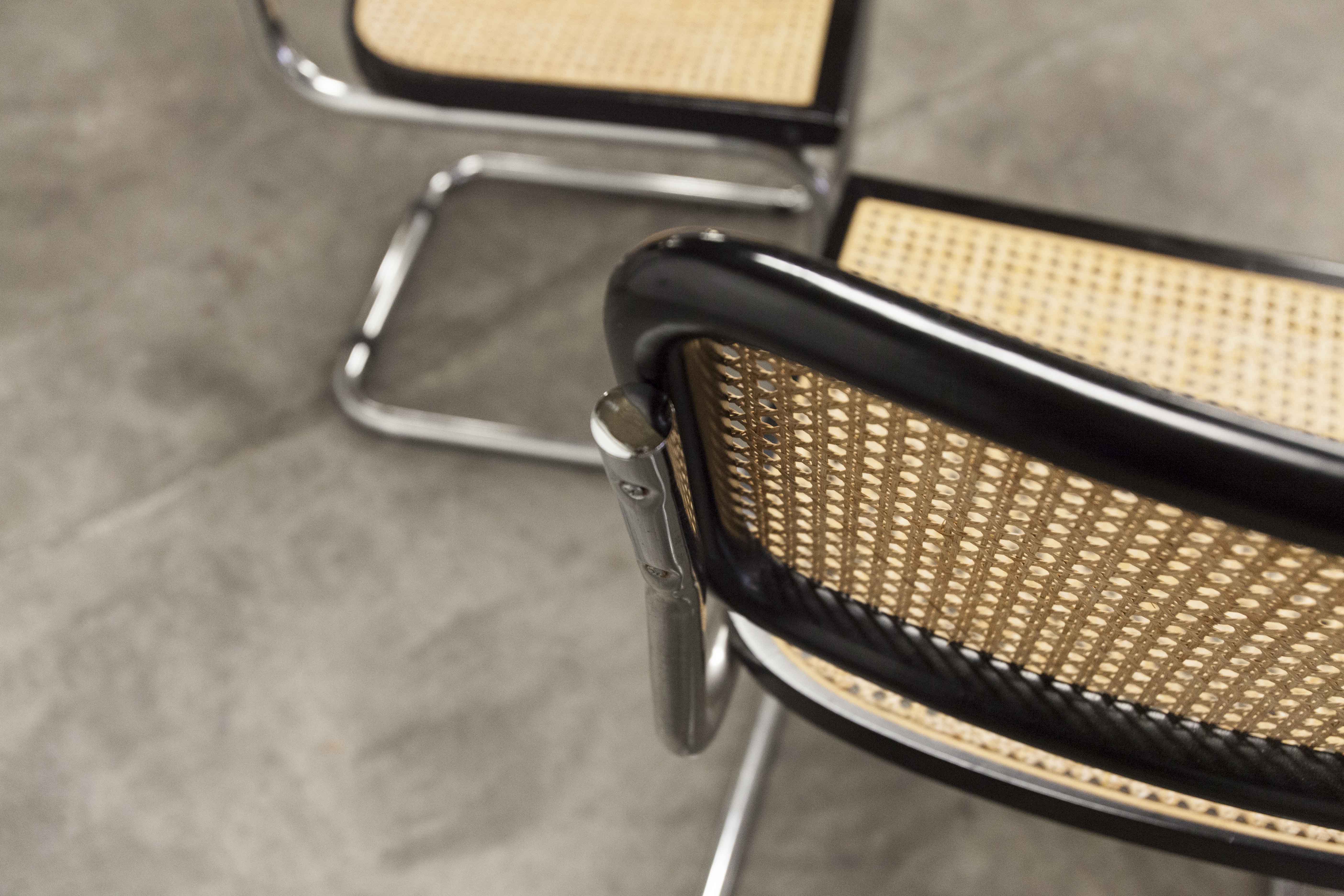Pair of black Breuer b32 chairs and cannage