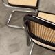 Pair of black Breuer b32 chairs and cannage