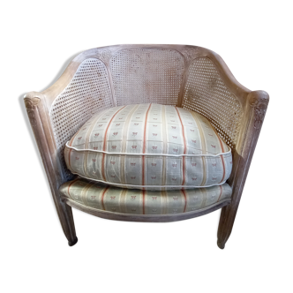 Canned basket armchair