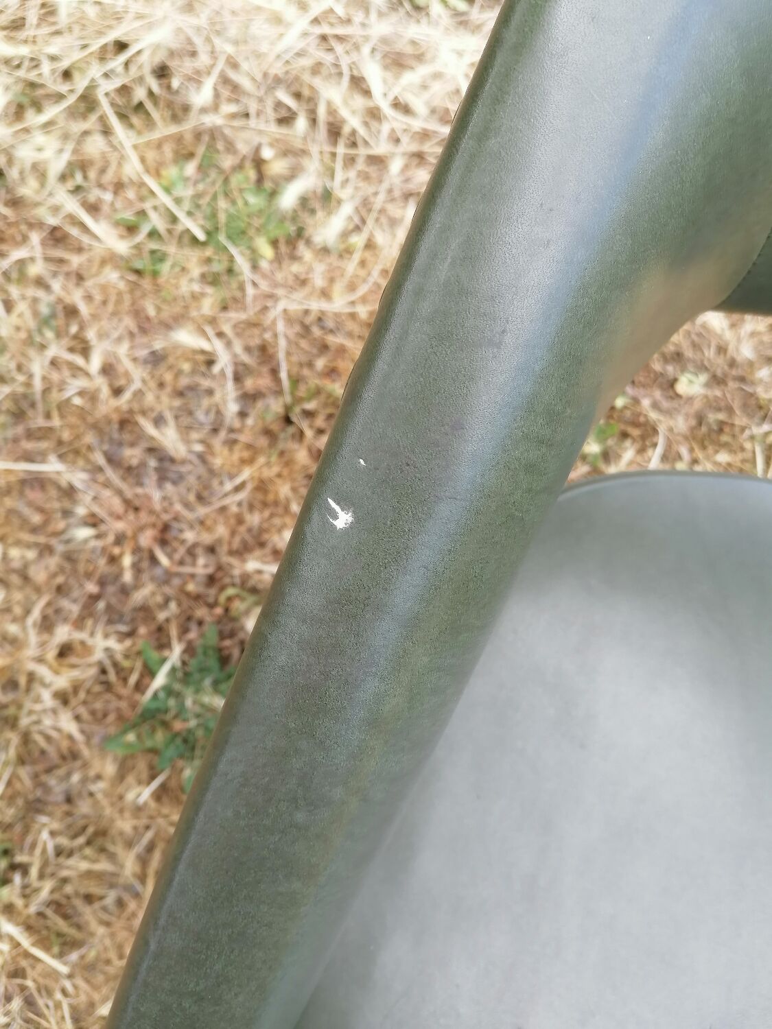 Vintage conference armchair in green skai Roset SNA