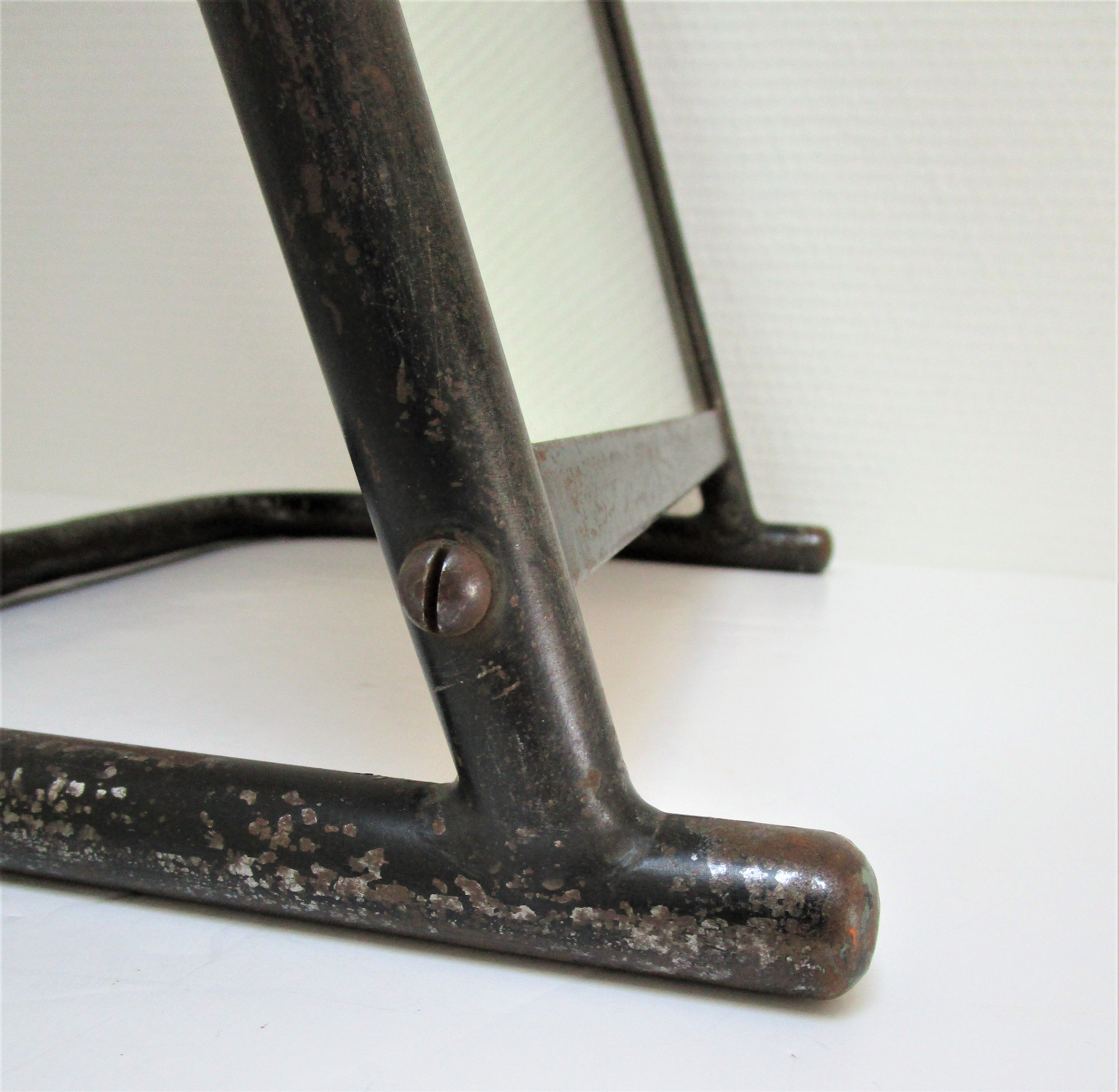 Vintage patinated metal shoe mirror