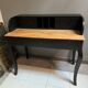 Black stepped wooden desk