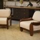 Brutalist pair of armchairs in mahogany and cream boucle 1970s.