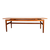 Large Danish teak coffee table with 2 side document holders, 1960.