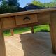 Large restored antique coffee table in solid oak.