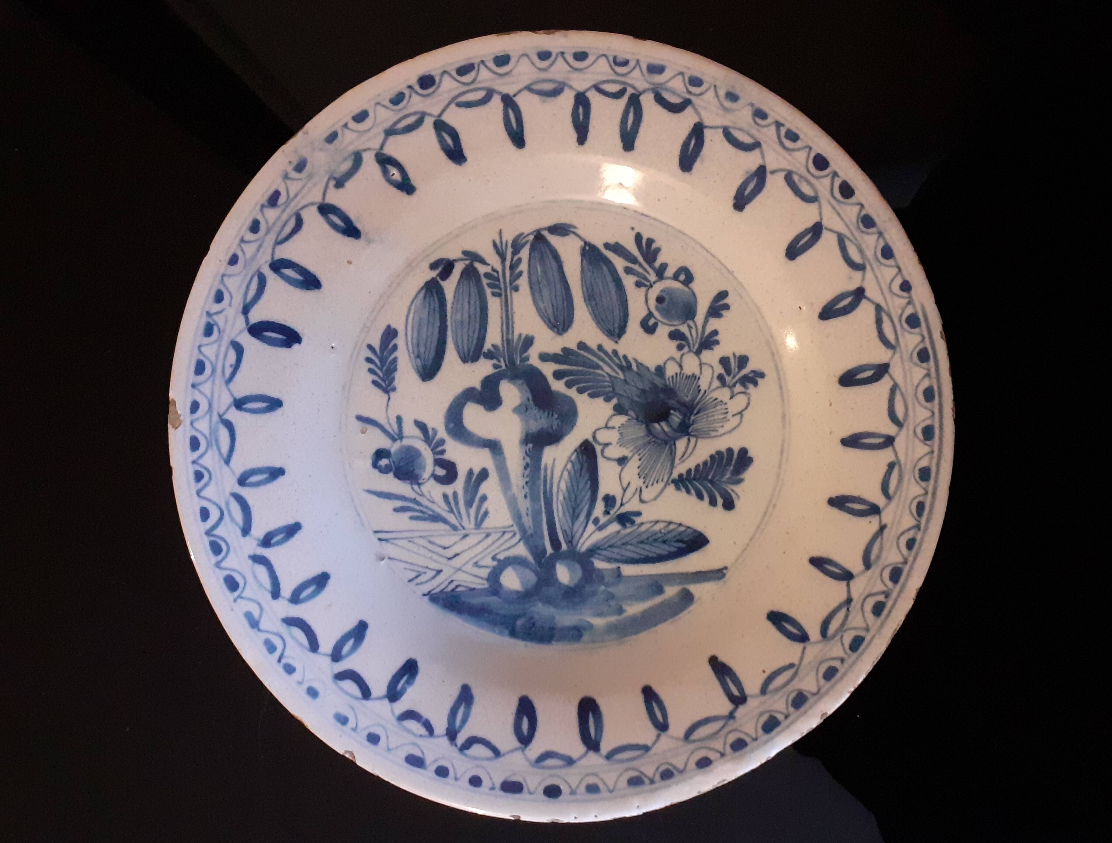 Old enamelled earthenware plate / Blue floral decoration