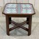 Art Deco side table in mahogany, fabric and glass.