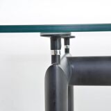 “LC6” table created by Le Corbusier, Pierre Jeanneret and Charlotte Perriand Published by Cassina