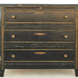 Chest of drawers in black lacquered wood