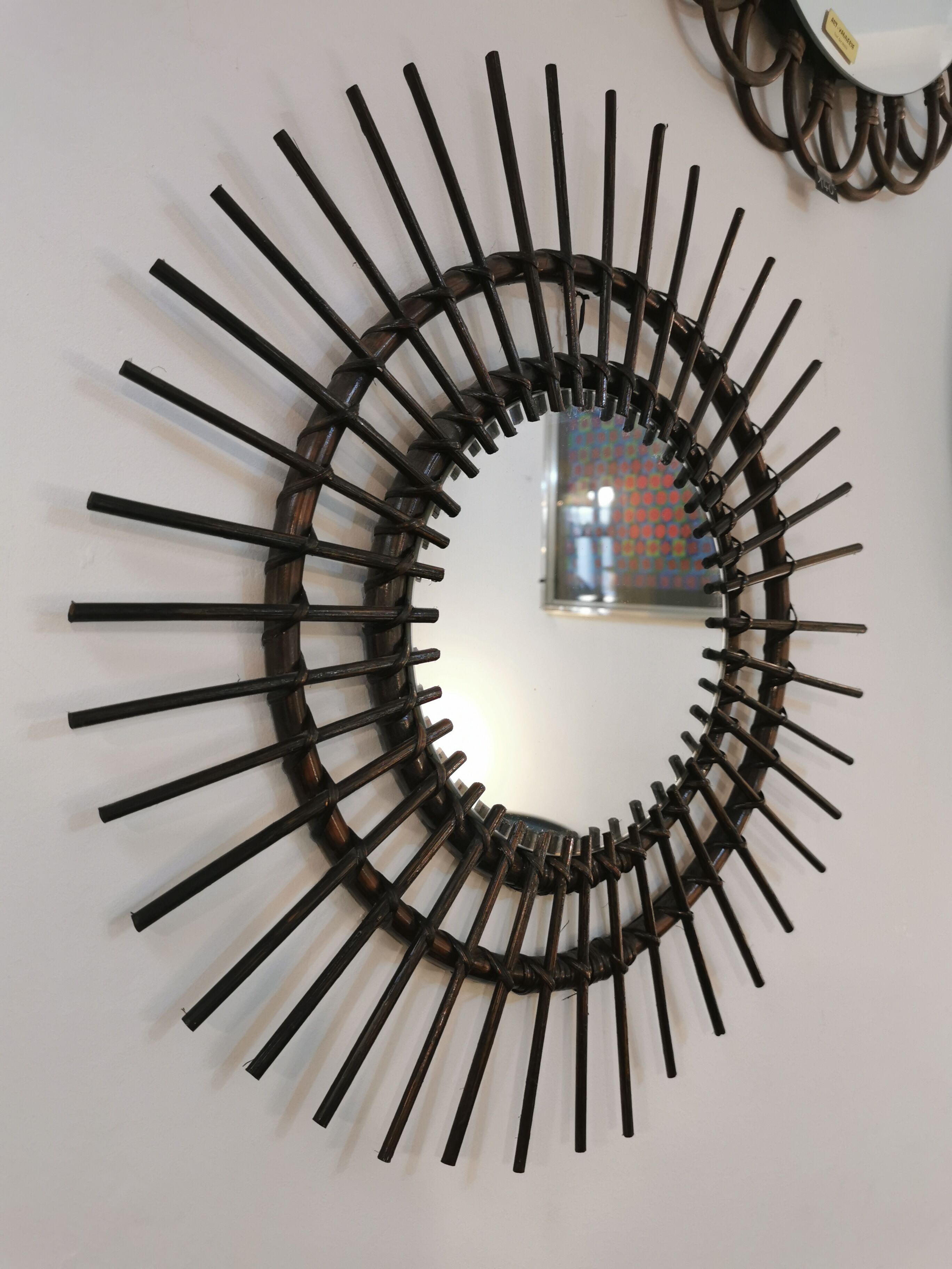 Vintage sun mirror in 60s dark rattan 56cm