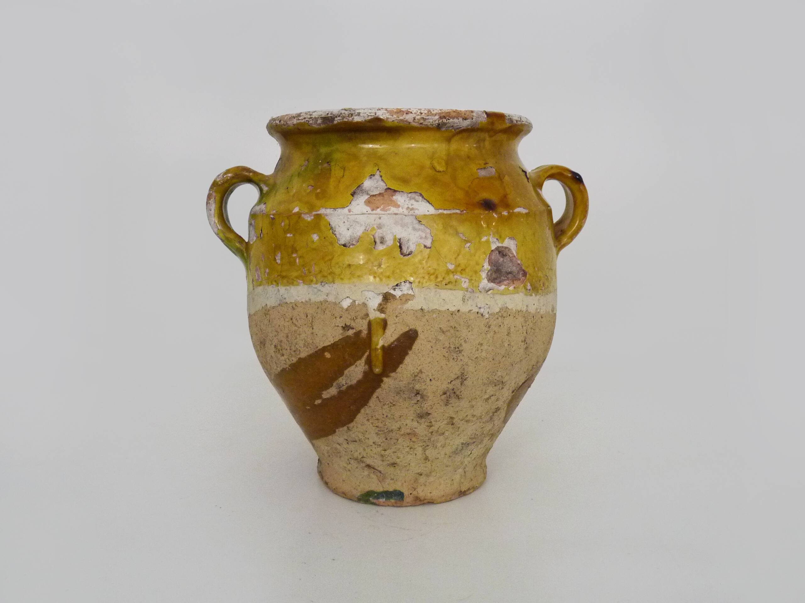 Magnificent glazed yellow confit pot, south-west of France. 19th century.