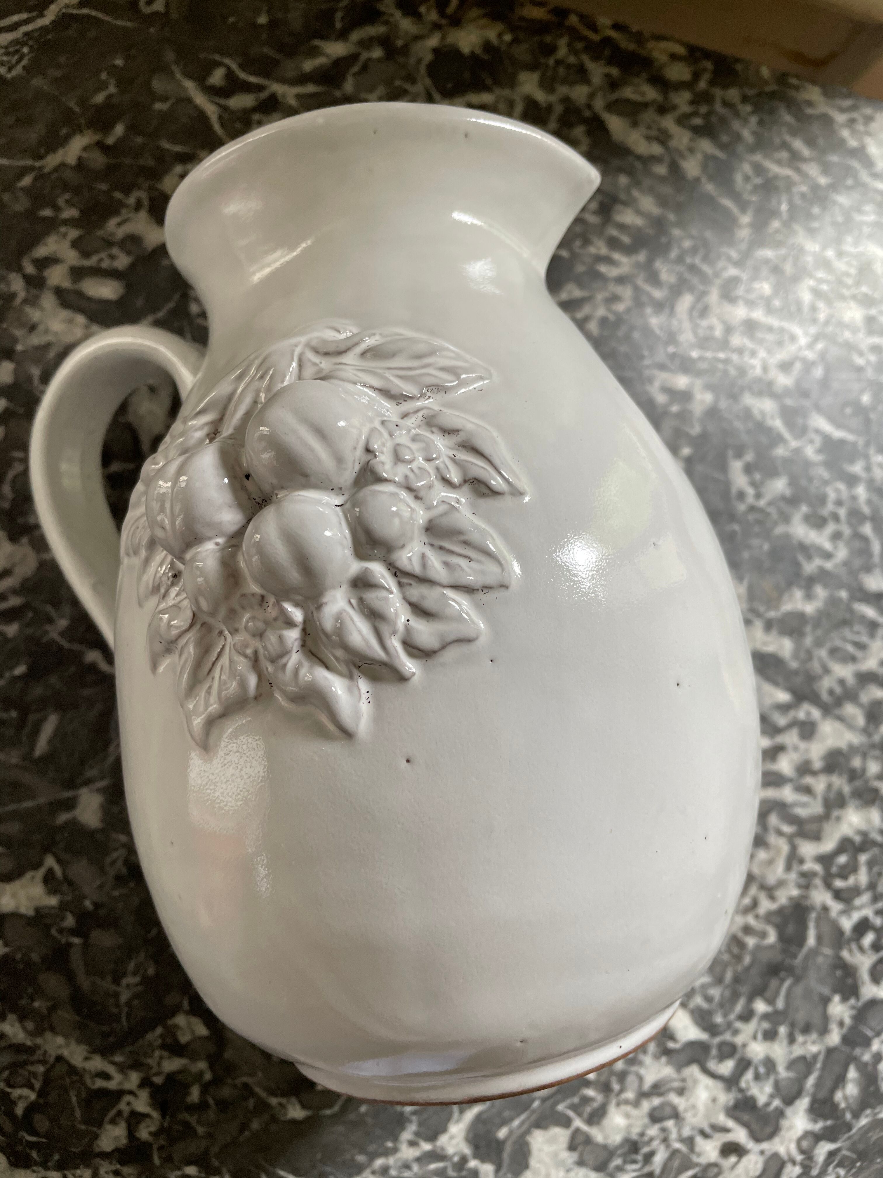 Pitcher in dabbling cherry decoration