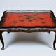 Low table in chinese black and red lacquer from the 19th century with independent tray