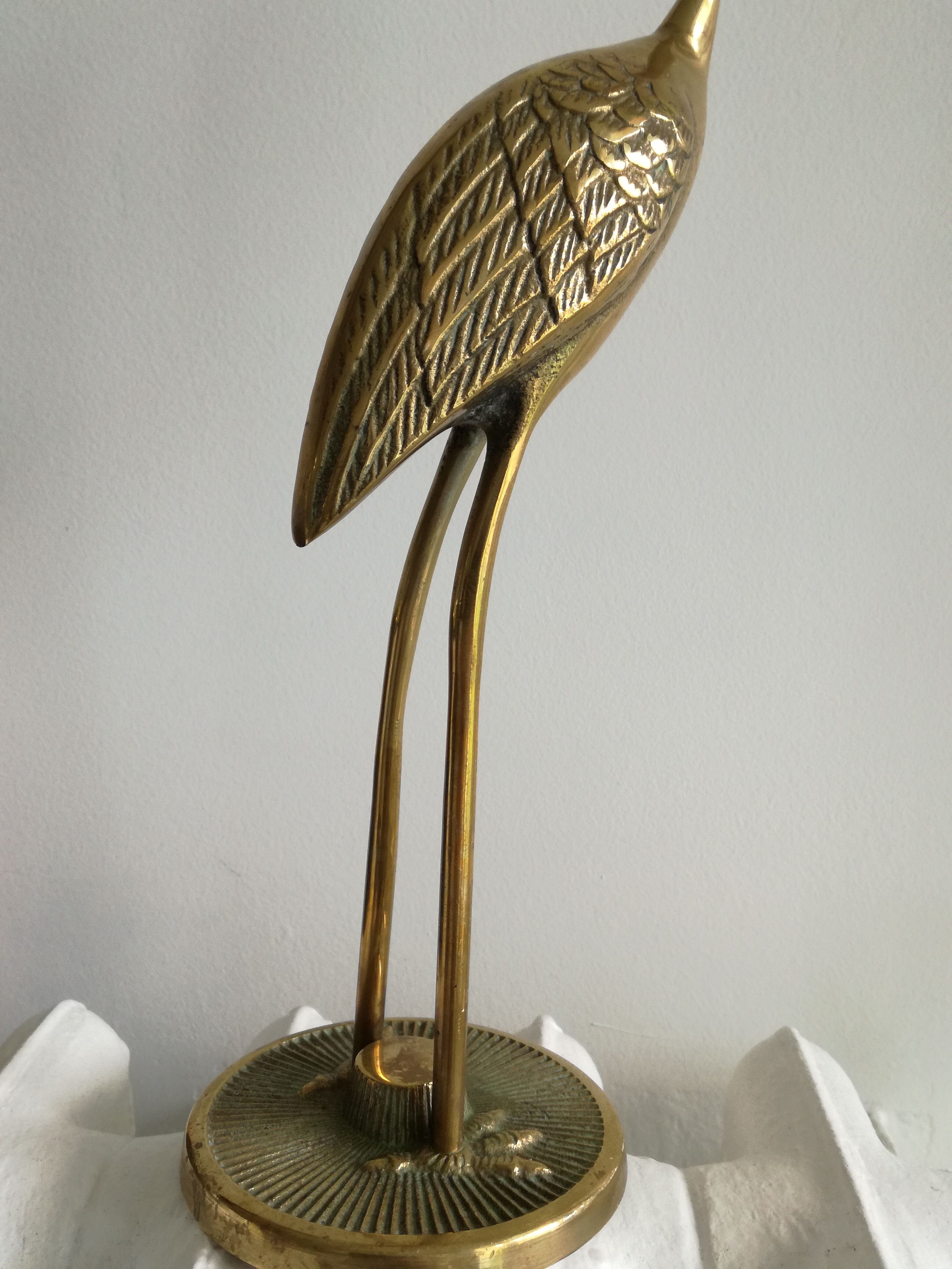 Heron vintage brass