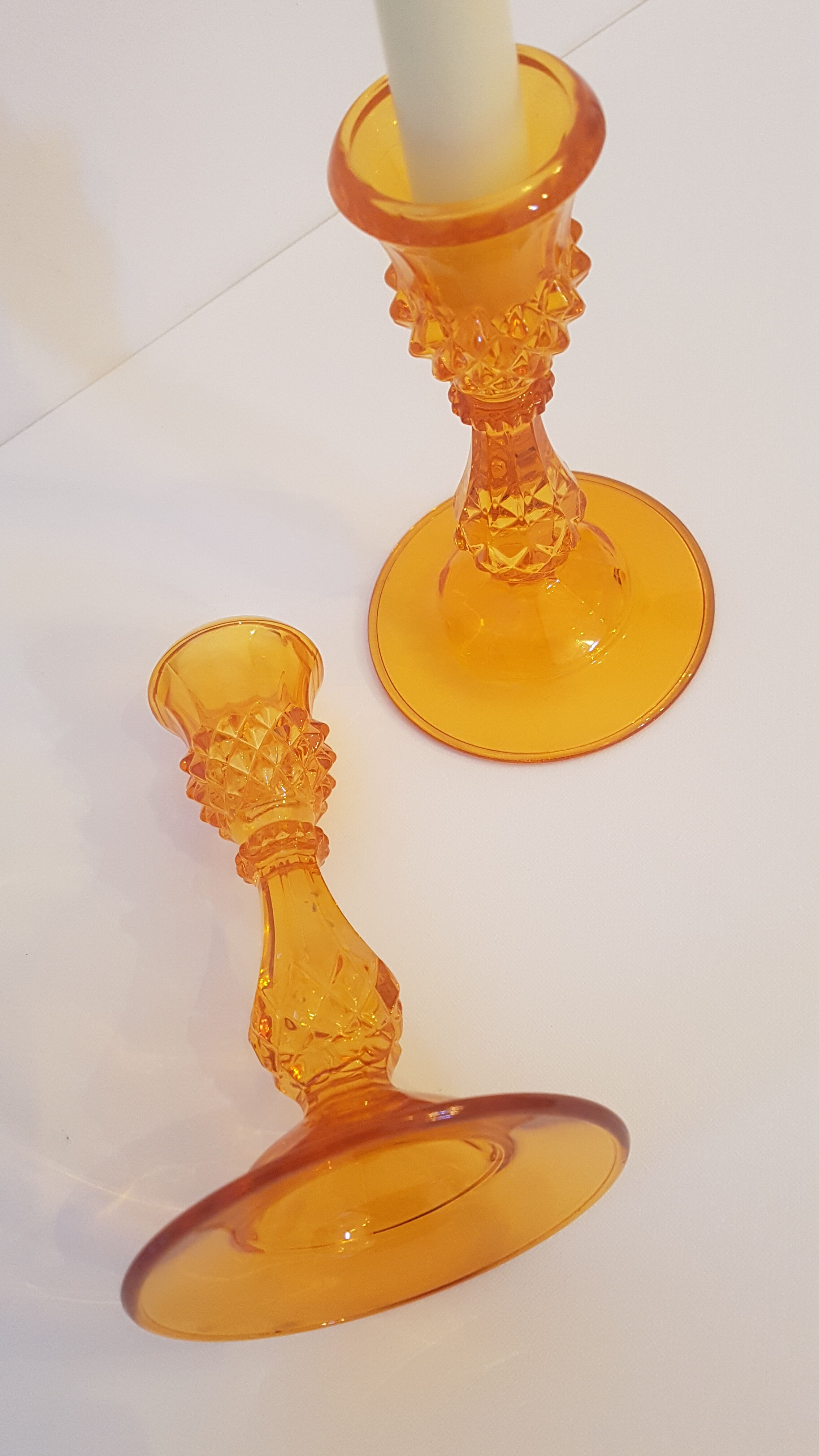 Set of 2 orange glass candle holders