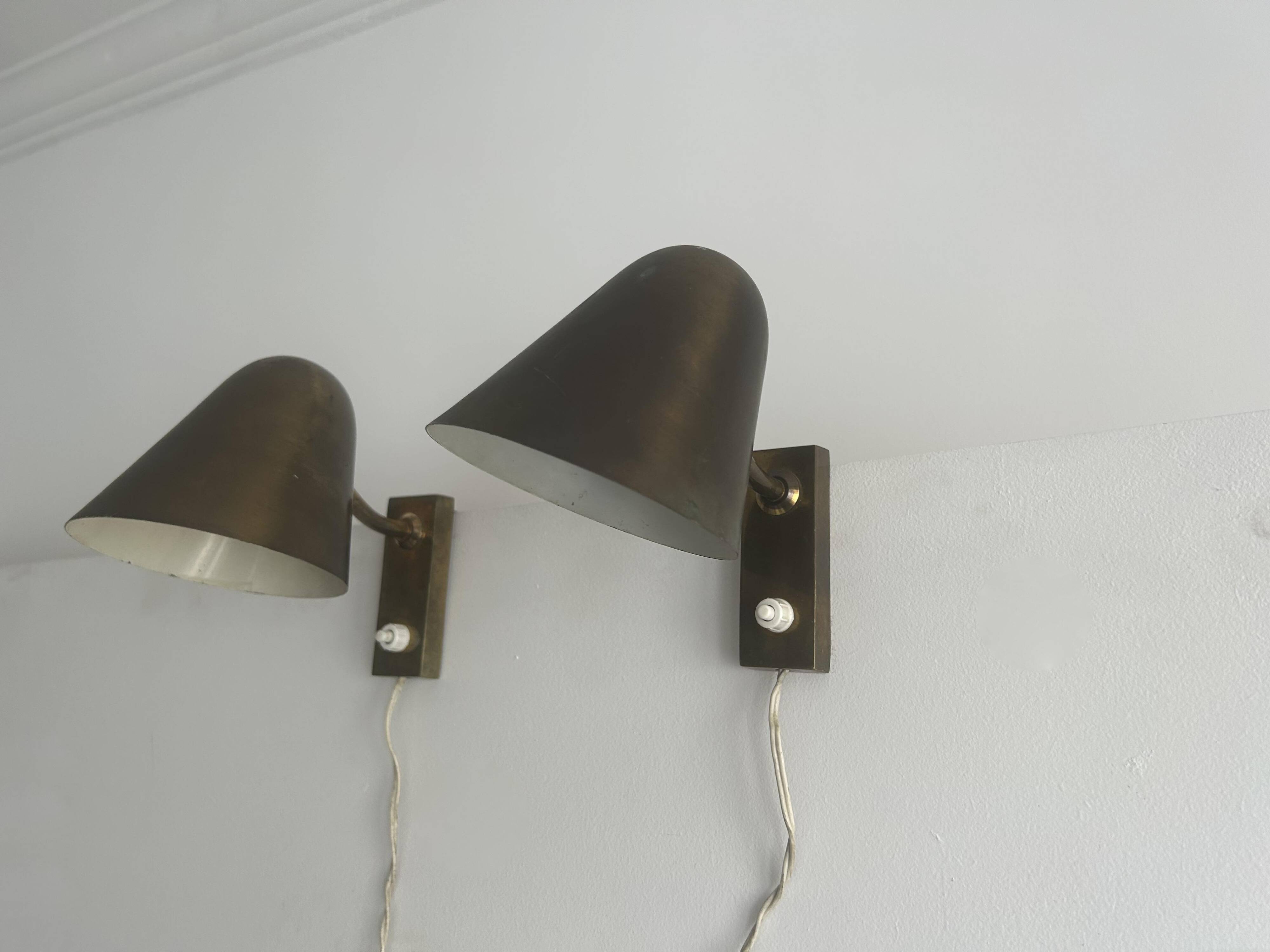 Pair of vintage adjustable wall lights, solid brass, France 1940
