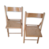 2 folding chairs canned