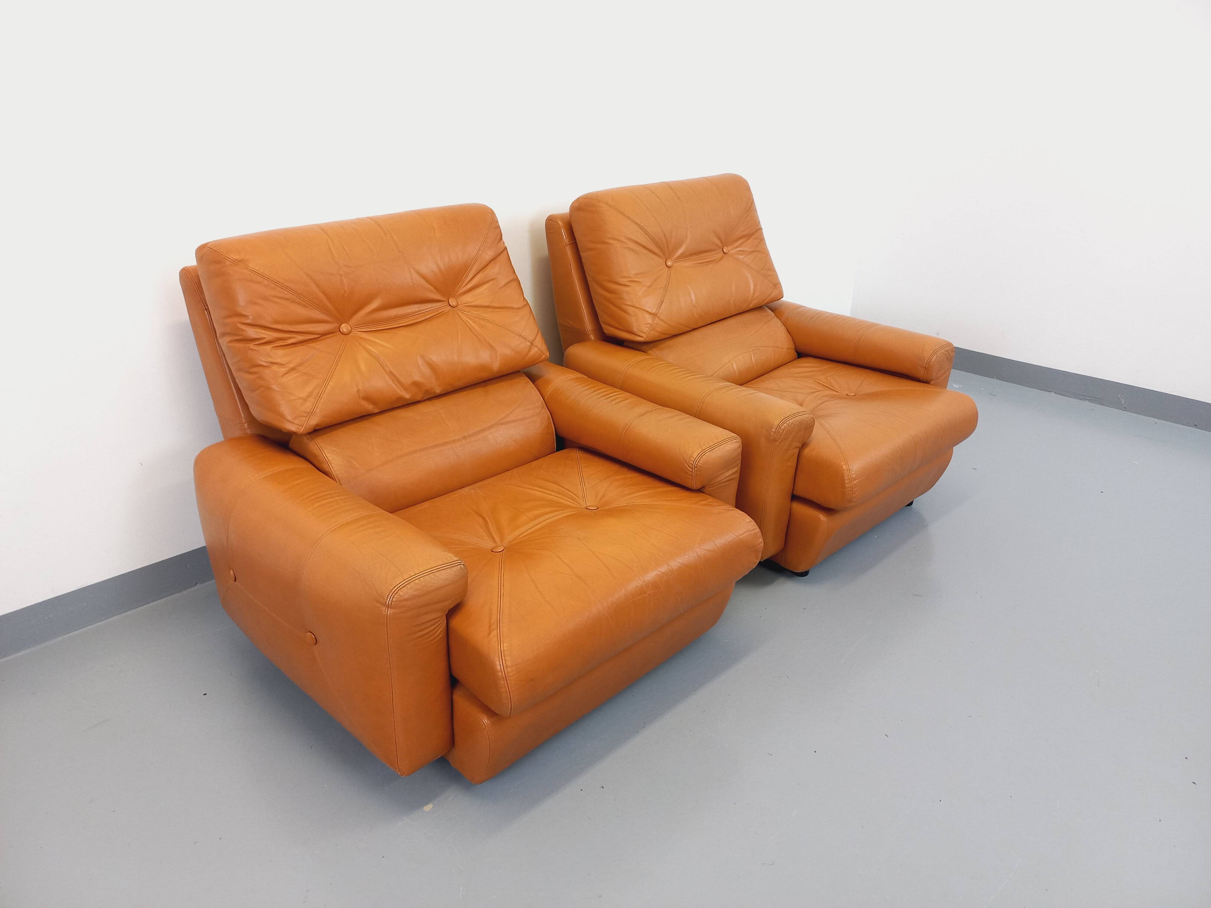 Pair of vintage leather lounge chairs from the 60s and 70s