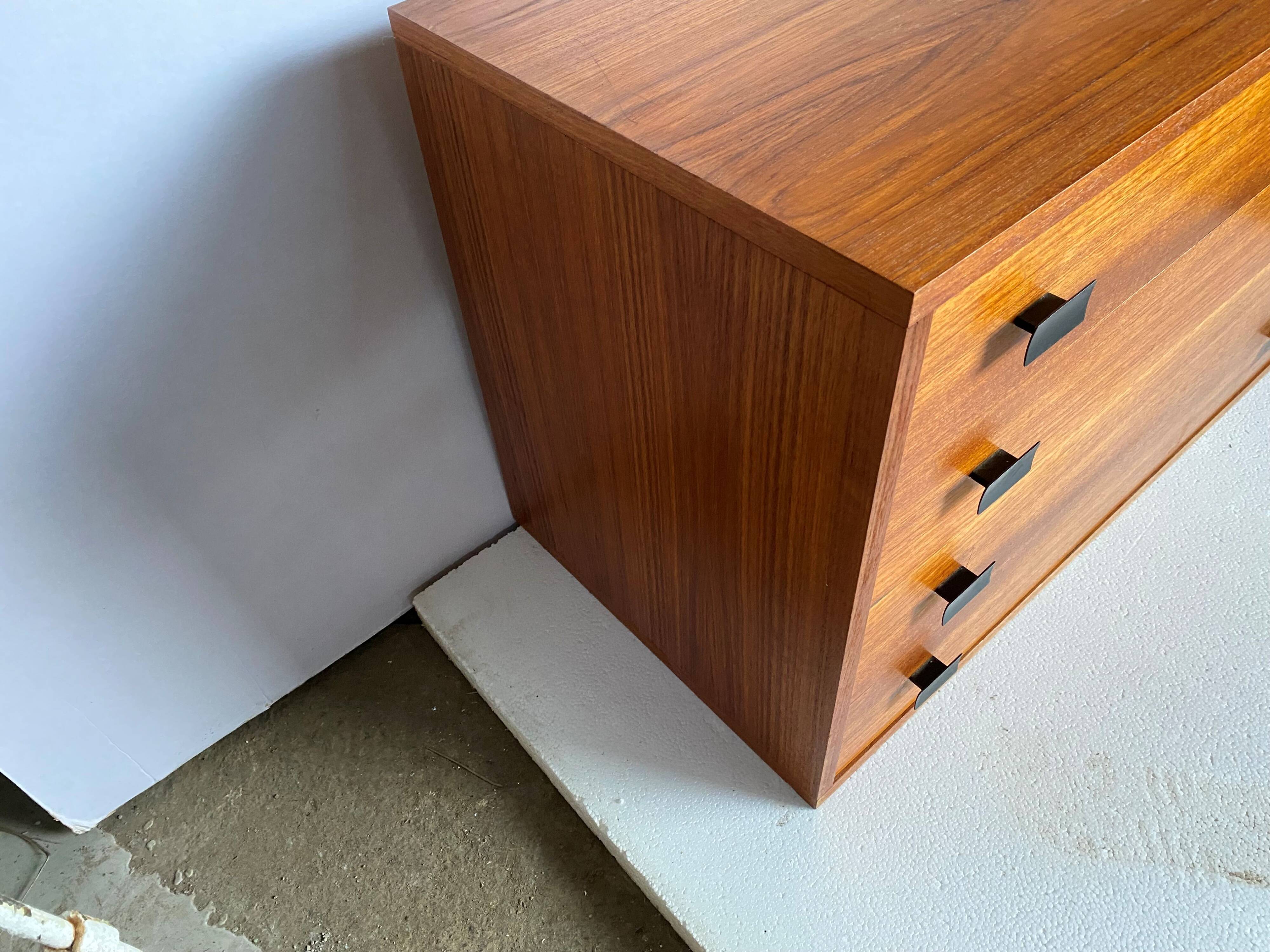 Convenient storage unit in Scandinavian teak from the 60s