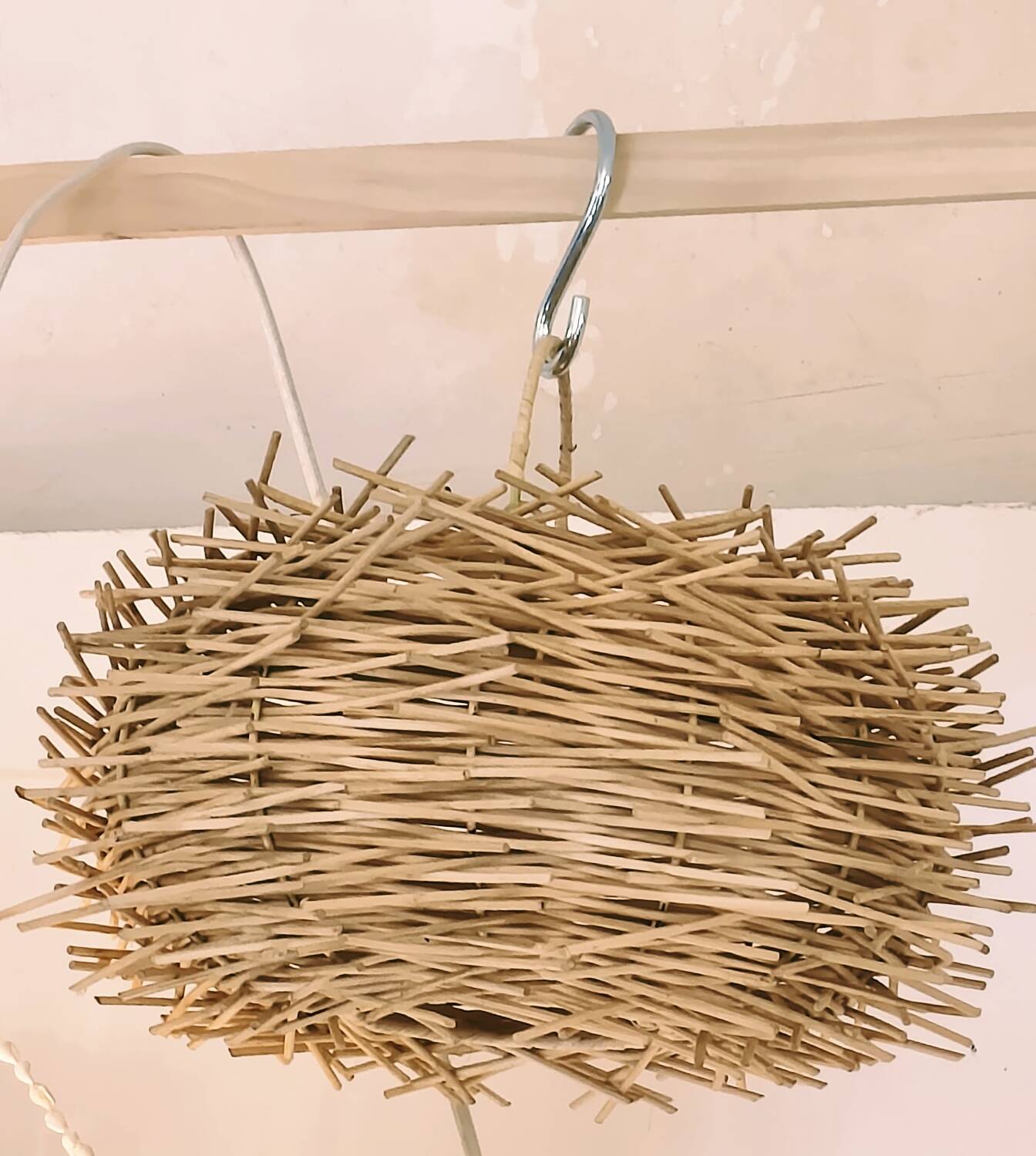 Rattan pendant in the shape of a nest