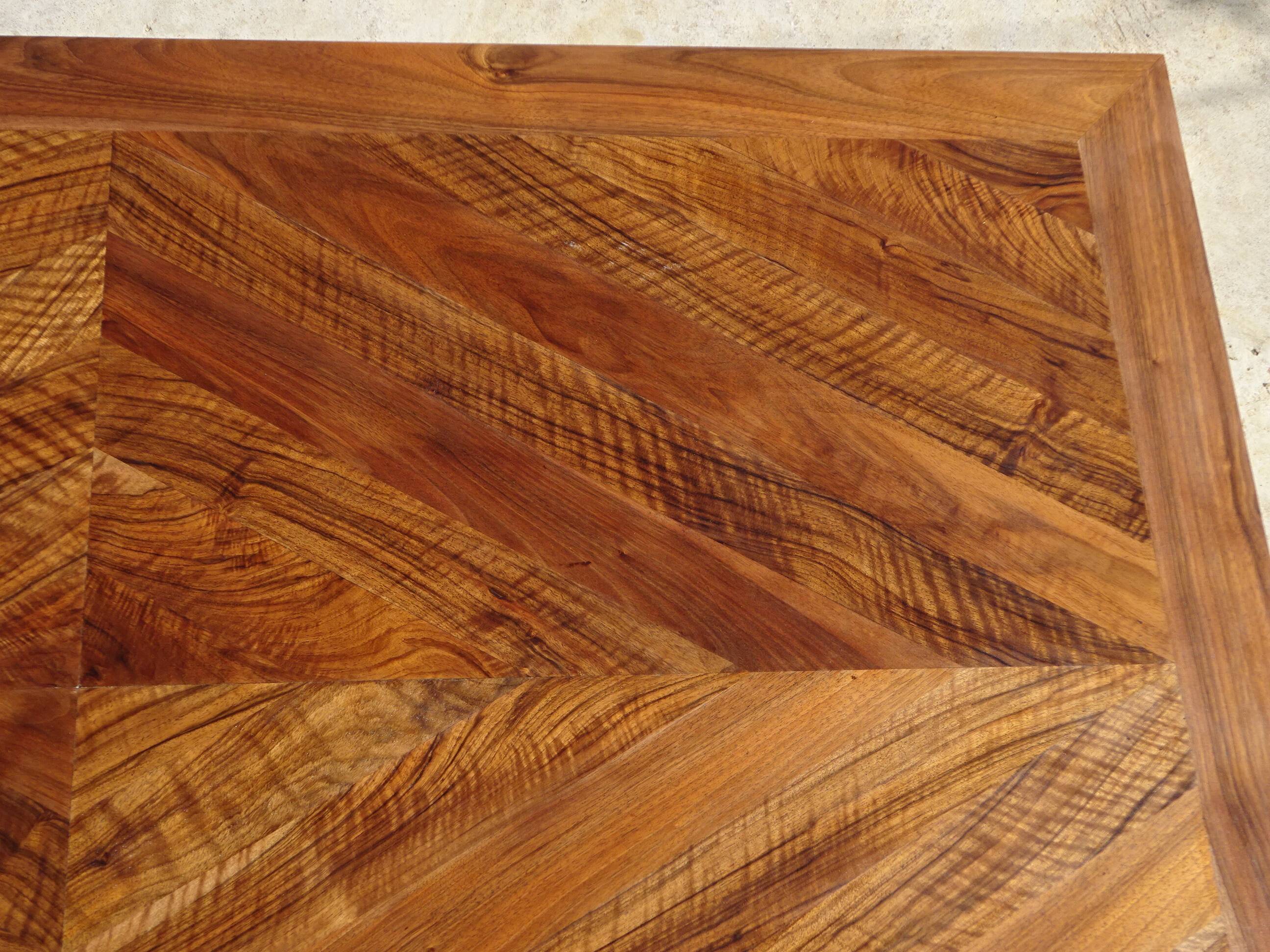 Antique solid walnut table with marquetry and extensions.