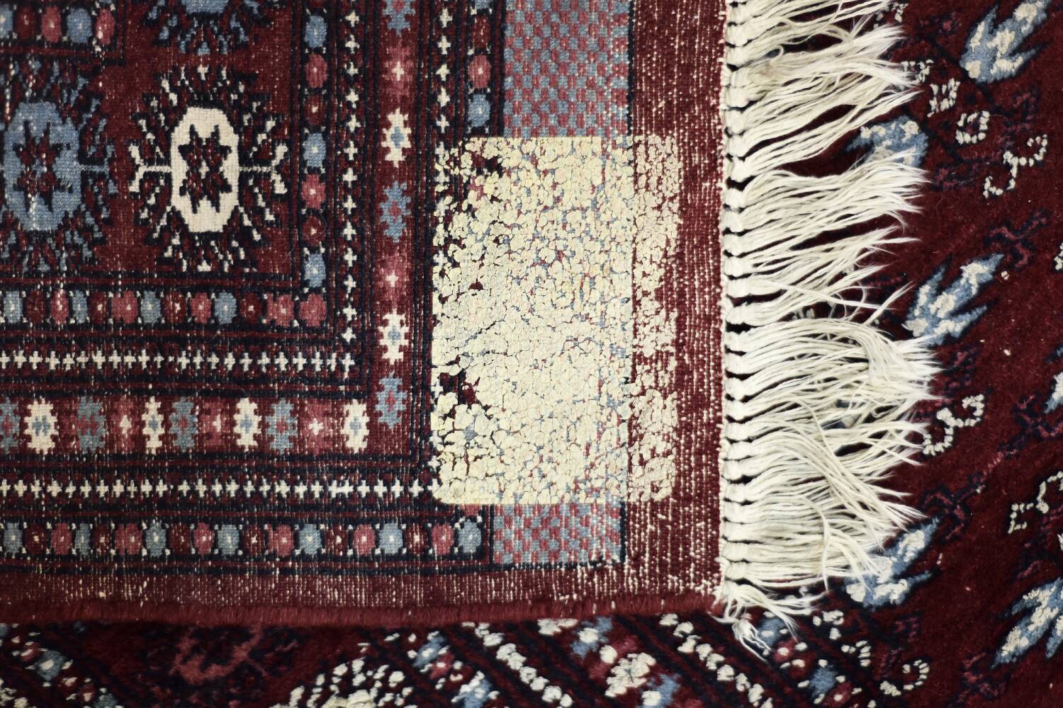 Handwoven red Boukhara oriental rug, 1960s