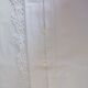 Old linen tablecloth with crocheted frills.