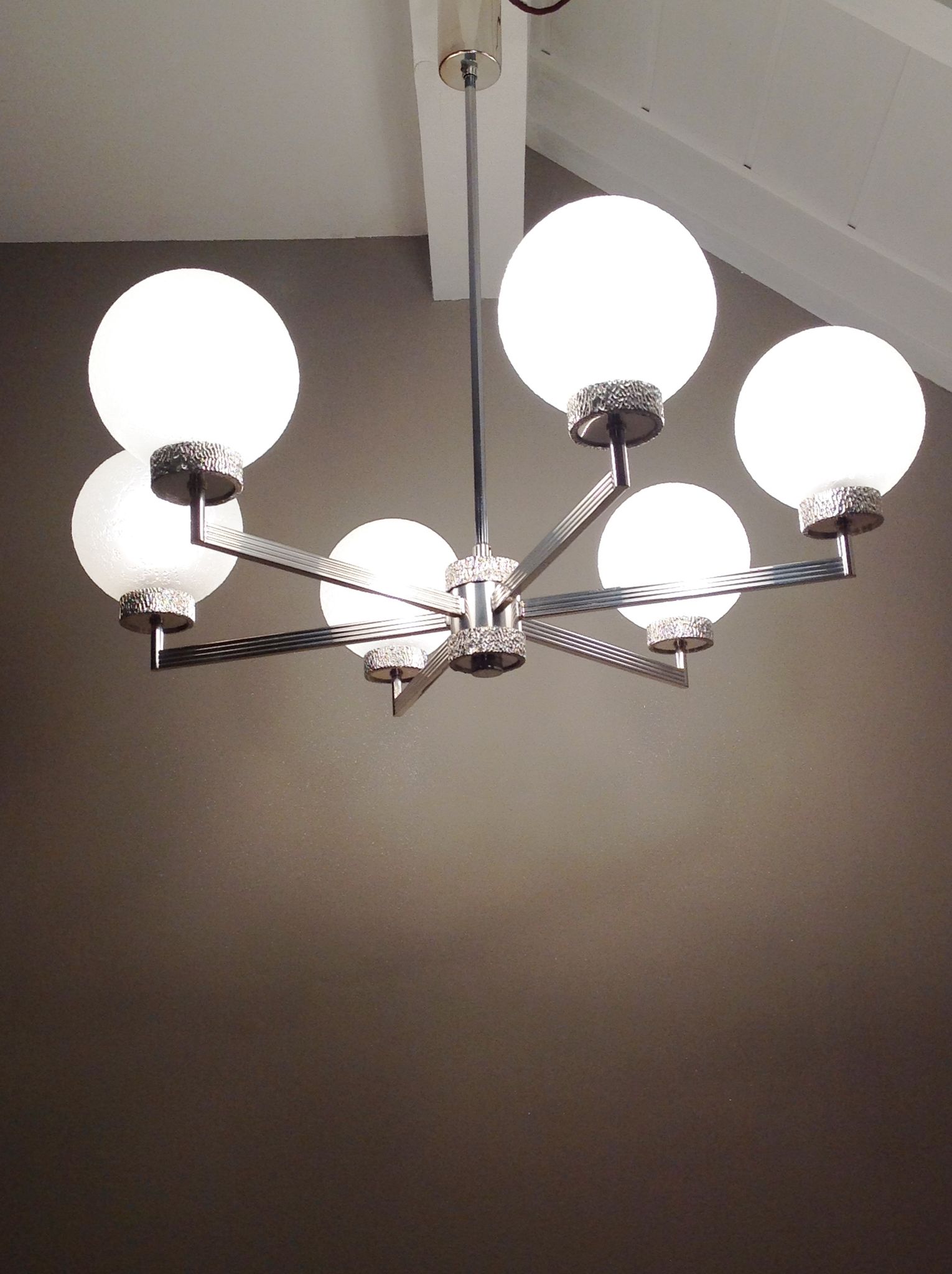 Six-light chrome metal chandelier and opaque glass globes / vintage 60s and 70s