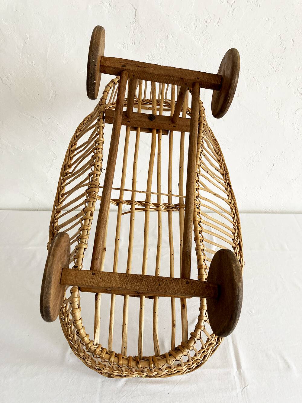 Old rattan doll's pram