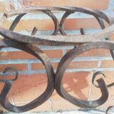 Wrought iron plant holders