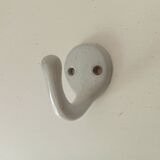 Antique enamelled cast iron wall hook from the 30s/40s