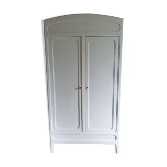 Two-door white Parisian wardrobe