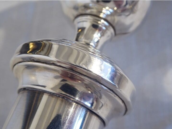 Pair of silver metal candle holders