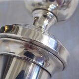 Pair of silver metal candle holders