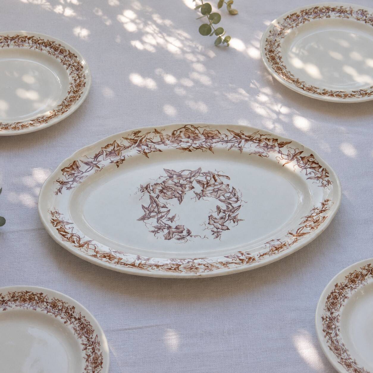 Oval dish from the 19th century in ironstone signed Longchamp "Liserons"